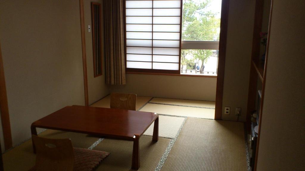 雅买池贝坎酒店 廿日市 客房 照片
