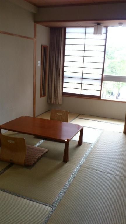 雅买池贝坎酒店 廿日市 客房 照片